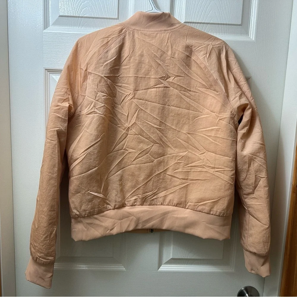 Lulu🍋Non-Stop Reversible Bomber Jacket in the color Bleached Apricot Size 10 - Picture 2 of 5